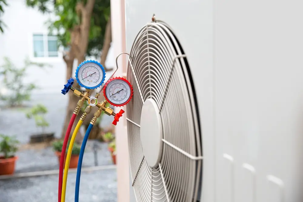 HVAC technician testing furnace components with diagnostic tools indoors, Specialist performing AC repair in Paradise - NV while testing airflow through a ceiling return vent, AC Repair in Enterprise - NV as a technician tests an outdoor unit beside a stucco home